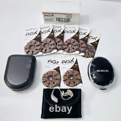 AGXO K130 hearing aids/Right Side & A Box Of 8 Packs Of Batteries, and 3 cases