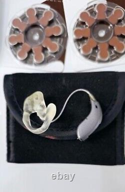 AGXO K130 hearing aids/Right Side & A Box Of 8 Packs Of Batteries, and 3 cases